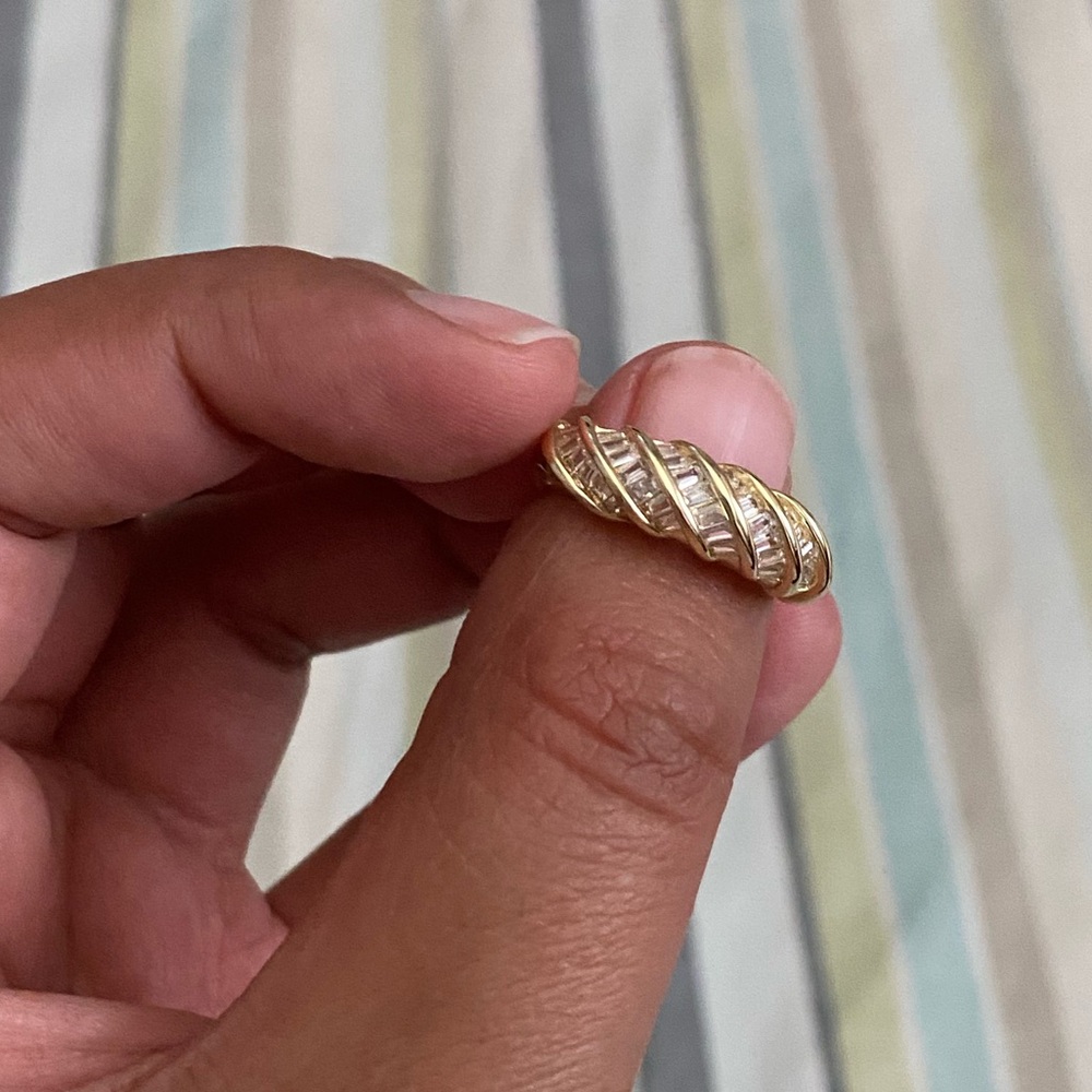 Twist baguette croissant ring with cubic zirconia stones